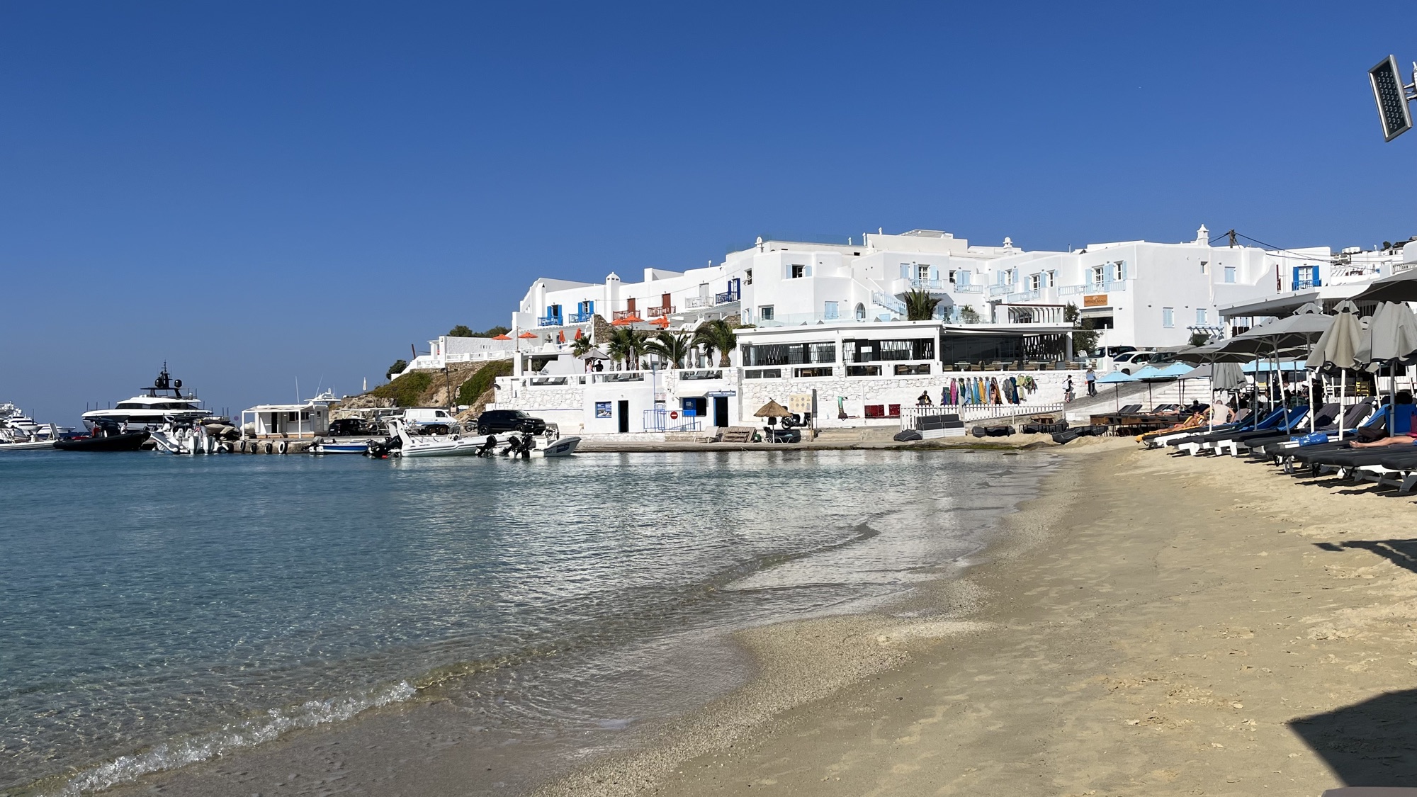 Whitewashed harbor town on the coast of Mykonos, Greece